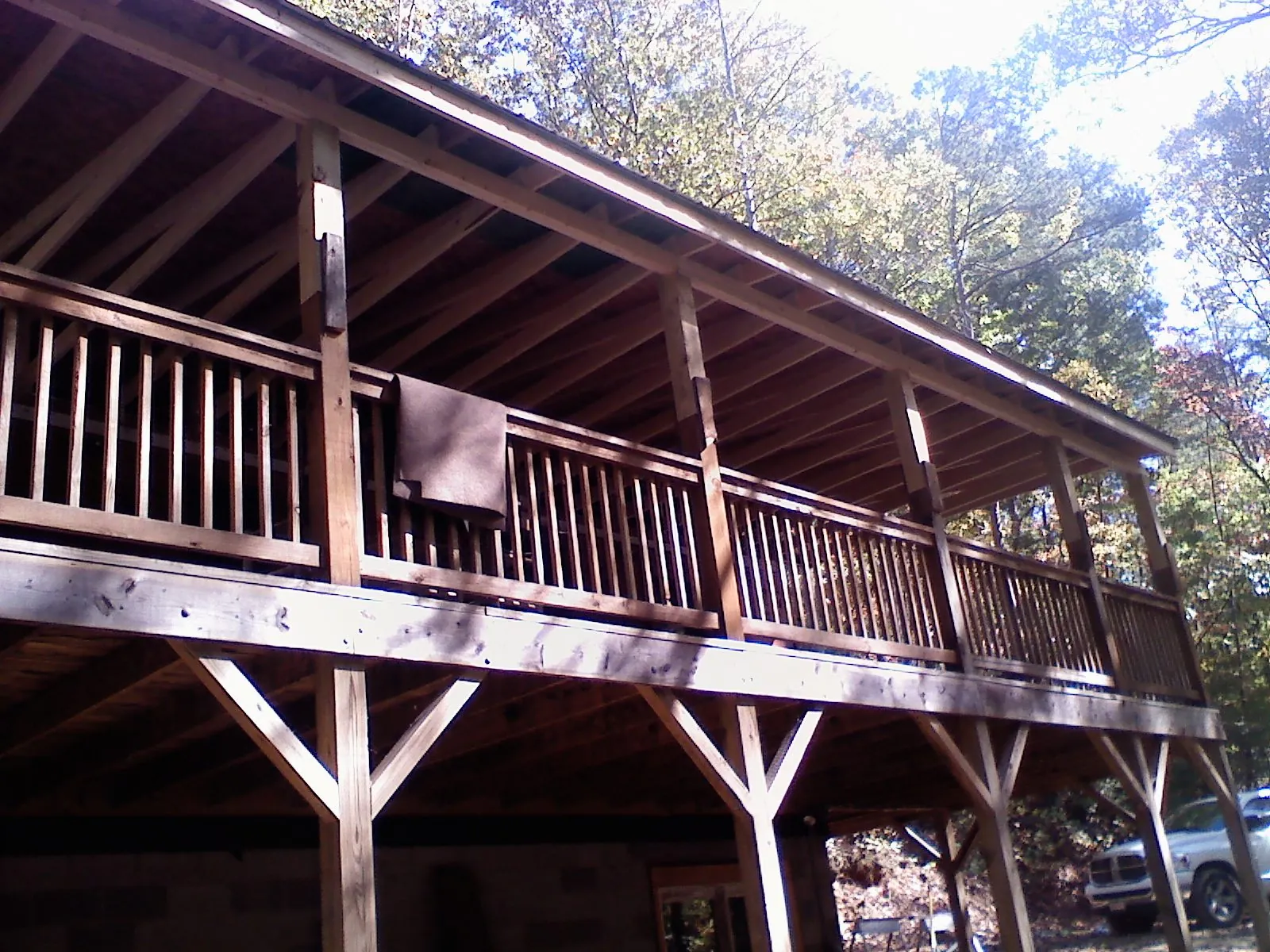 Timber framing under a new elevated porch and deck — Roof Leak Repair in Rush Springs by Roofing Brothers
